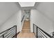 Elegant staircase with black railings leads to the upper level of the home at 1029 9Th St, Boulder, CO 80302