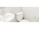 Close up on a white sink and toilet in a clean bathroom at 22415 E 7Th Pl, Aurora, CO 80018