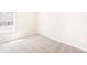 Cozy bedroom featuring carpet, window, and outlets at 22415 E 7Th Pl, Aurora, CO 80018