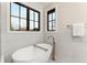 Relaxing bathroom with freestanding tub and modern fixtures at 1149 S Madison St, Denver, CO 80210