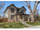 Stunning two-story brick home with a modern design and landscaped front yard at 1149 S Madison St, Denver, CO 80210