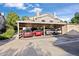 Assigned covered parking near a well-maintained multi-unit residential building at 3857 Mossy Rock Dr # 201, Highlands Ranch, CO 80126
