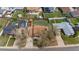An aerial view of a home with a well-maintained backyard, shed, and solar panels at 11506 Fowler Dr, Northglenn, CO 80233