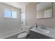 Updated bathroom with modern fixtures, subway tiles and soaking tub at 11506 Fowler Dr, Northglenn, CO 80233