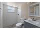 This bathroom features subway tile in the shower and a vanity with gray cabinets at 11506 Fowler Dr, Northglenn, CO 80233