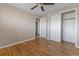 Cozy bedroom with hardwood floors and a large closet for ample storage at 11506 Fowler Dr, Northglenn, CO 80233