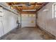 Spacious garage featuring a white door and ample room for storage at 11506 Fowler Dr, Northglenn, CO 80233