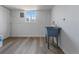 This laundry room features gray vinyl flooring and a utility sink at 11506 Fowler Dr, Northglenn, CO 80233