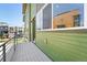 Modern balcony featuring metal railings and light wood floors at 815 Promenade Dr, Superior, CO 80027