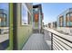 Spacious outdoor balcony with modern metal railing and view of the street at 815 Promenade Dr, Superior, CO 80027