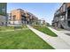 Beautiful community park featuring landscaped green spaces and walking paths at 815 Promenade Dr, Superior, CO 80027