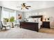 Serene main bedroom suite with lots of light, ceiling fan, and modern furnishings at 2307 Candleglow St, Castle Rock, CO 80109