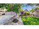 Inviting home with a three-car garage, a lush lawn, mature trees, and a well-maintained brick facade for curb appeal at 2990 E 135Th Dr, Thornton, CO 80241