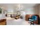 Spacious loft with hardwood accents, and comfortable furniture at 2990 E 135Th Dr, Thornton, CO 80241