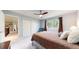 Bright main bedroom features a comfortable bed, and large window at 2990 E 135Th Dr, Thornton, CO 80241