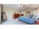 Comfortable bedroom featuring soft carpet, a vaulted ceiling, a cozy bed, and neutral walls for a relaxing retreat at 2990 E 135Th Dr, Thornton, CO 80241