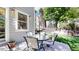 Charming patio with a glass table and seating, perfect for outdoor dining and relaxation at 2990 E 135Th Dr, Thornton, CO 80241