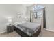 Inviting bedroom with large window, neutral color palette, and comfortable carpet flooring at 4929 W 73Rd Ave, Westminster, CO 80030