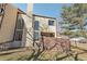 Exterior view of property showing patio and chimney at 4929 W 73Rd Ave, Westminster, CO 80030