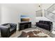 Spacious living room with comfortable seating and a modern entertainment setup at 4929 W 73Rd Ave, Westminster, CO 80030