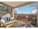 Charming patio space with comfortable seating and views of the fenced backyard at 4929 W 73Rd Ave, Westminster, CO 80030