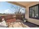 Inviting patio with wooden deck, privacy fence, and space for outdoor dining at 4929 W 73Rd Ave, Westminster, CO 80030