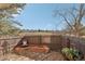 Cozy outdoor patio area features a brick firepit and a beautiful view at 4929 W 73Rd Ave, Westminster, CO 80030