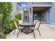 Inviting backyard patio with an outdoor dining set perfect for entertaining and enjoying outdoor meals at 9682 Dunning Cir, Highlands Ranch, CO 80126
