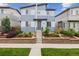 Charming two-story home featuring tasteful landscaping and a welcoming front entrance, perfect for curb appeal at 9682 Dunning Cir, Highlands Ranch, CO 80126