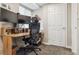 Home office area with desk, chair, and natural light at 9682 Dunning Cir, Highlands Ranch, CO 80126