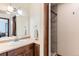 Stylish bathroom with modern fixtures, shower, and ample counter space offers convenience and comfort at 6351 S Andes Pl, Centennial, CO 80016