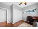 Cozy bedroom featuring hardwood floors, a closet, a ceiling fan and neutral walls at 16110 Poplar St, Brighton, CO 80602