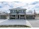 Beautiful two-story home featuring brick accents, a large yard, and a spacious driveway at 16110 Poplar St, Brighton, CO 80602