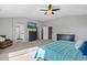 Large main bedroom with a ceiling fan, an ensuite bathroom, and ample closet space at 16110 Poplar St, Brighton, CO 80602