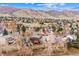 Aerial view of neighborhood featuring lush trees and mountain view at 4 Mountain Ash, Littleton, CO 80127