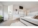 Airy bedroom with vaulted ceiling features ensuite bathroom and closet access at 4 Mountain Ash, Littleton, CO 80127
