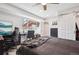 Bedroom features desk, dual monitors, ceiling fan, and natural light at 4 Mountain Ash, Littleton, CO 80127