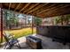 Outdoor patio with hot tub, fire pit and view of the backyard at 4 Mountain Ash, Littleton, CO 80127