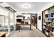 Bedroom featuring a sliding door leading outside, a closet, and shelving for storage at 11210 Parliament Way, Parker, CO 80138