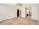 Spacious bedroom featuring a ceiling fan and an ensuite bathroom at 8040 S Culebra Peak, Littleton, CO 80127
