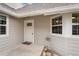 Inviting front entrance with a charming welcome mat and stylish details at 8040 S Culebra Peak, Littleton, CO 80127