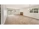 Spacious living room features a cozy fireplace and sliding door access to the outside at 8040 S Culebra Peak, Littleton, CO 80127