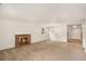 Inviting living room with a brick fireplace and ample natural light at 8040 S Culebra Peak, Littleton, CO 80127
