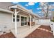 Covered patio area with outdoor seating, offering a perfect spot for relaxation and enjoying the outdoors at 8040 S Culebra Peak, Littleton, CO 80127