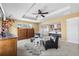 Spacious main bedroom featuring a sitting area, tray ceiling, and private ensuite at 1114 Lasnik St, Erie, CO 80516