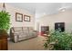 Cozy living room with neutral walls, carpet and a comfortable sofa at 16525 Sanford St, Mead, CO 80542