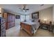 Cozy bedroom with a wooden bed frame and built-in wardrobe at 1035 Cryolite Pl, Castle Rock, CO 80108