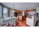 Kitchen dinette area with hardwood floors and window seating at 1035 Cryolite Pl, Castle Rock, CO 80108