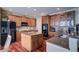 Spacious kitchen with island, granite counters, and stainless steel appliances at 1035 Cryolite Pl, Castle Rock, CO 80108