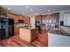 Spacious kitchen with island, granite counters, and stainless steel appliances at 1035 Cryolite Pl, Castle Rock, CO 80108